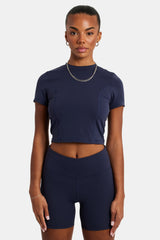 Female model wearing the fitted seam detail t-shirt in Navy