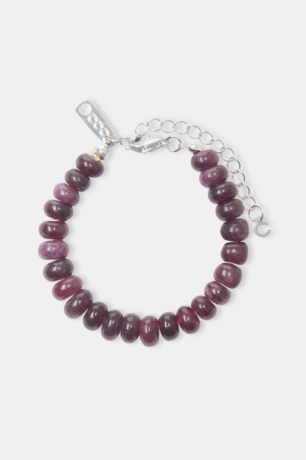 amethyst bead bracelet on white background